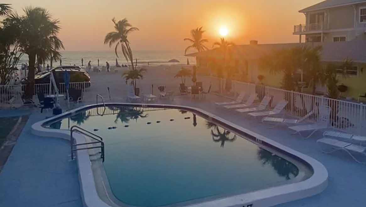 White Sands Beach Report sunset over pool